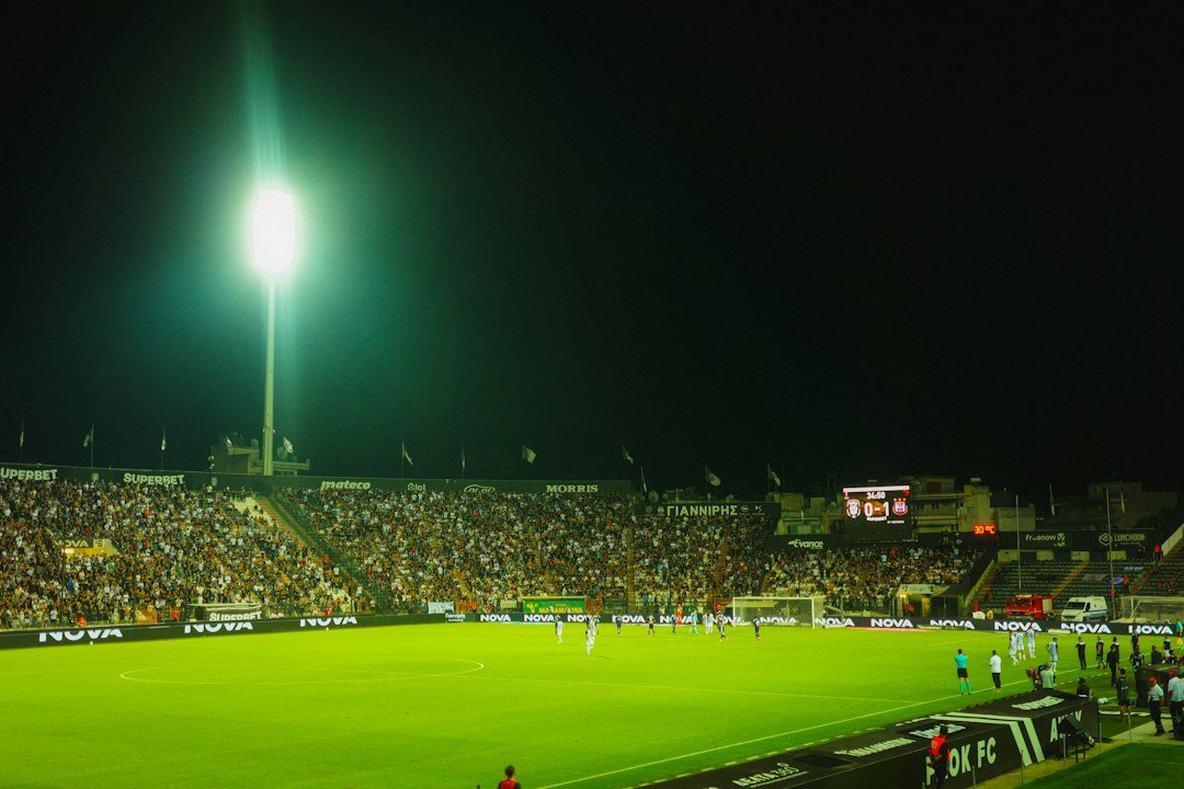 Football stadium under floodlights for the Radhe Football Admin Panel